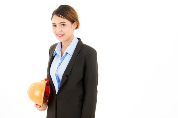 Giovane attraente donna asiatica fiduciosa, cappello di sicurezza arancione, vetro — Foto Stock