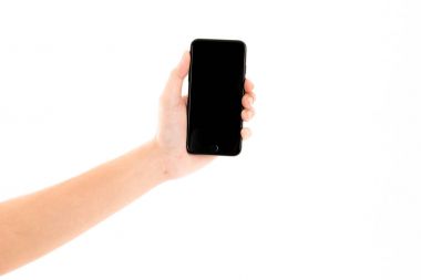 Bir akıllı telefon devic tutan güzel genç Asyalı kadın el kol