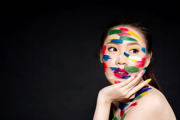 Body art abstract make up with surprise face.