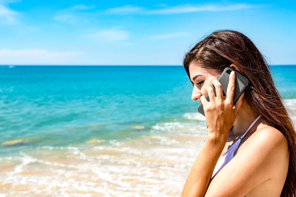 Beautiful Young Single White Woman Beach Talking Mobile Phone Wearing Royalty Free Stock Images
