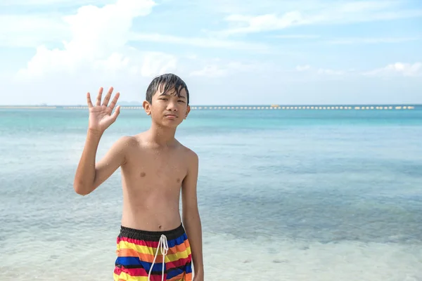 Young Chinese Boy Beach Portrait Young Boy Standing Ocean Waving — Stock Photo, Image