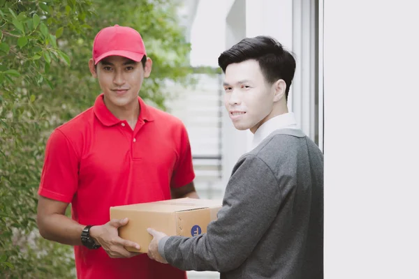 Young Logistic Career Concept Happy Delivery Man Giving His Package — Stock Photo, Image