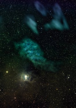 Uzayda bir yıldız alanı ve bir nebula