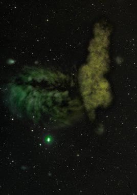 Uzayda bir yıldız alanı ve bir nebula