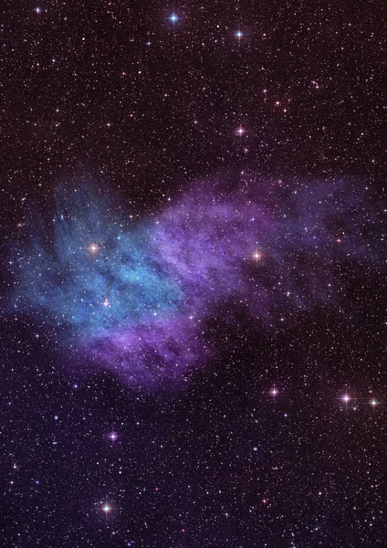 Uzayda bir yıldız alanı ve bir nebula — Stok fotoğraf