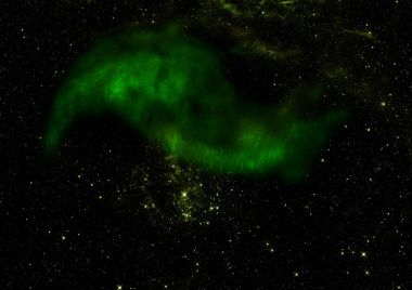 Uzayda bir yıldız alanı ve bir nebula