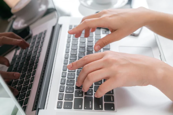 Closeup of business woman hand typing on laptop keyboard . — Stock Photo, Image