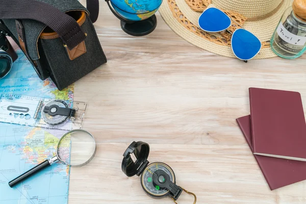 Travel preparation : compass, money, passport, road map ,hat,sun