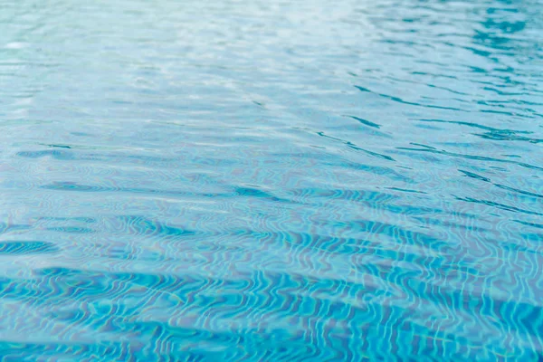 Blue swimming pool rippled water . — Stock Photo, Image