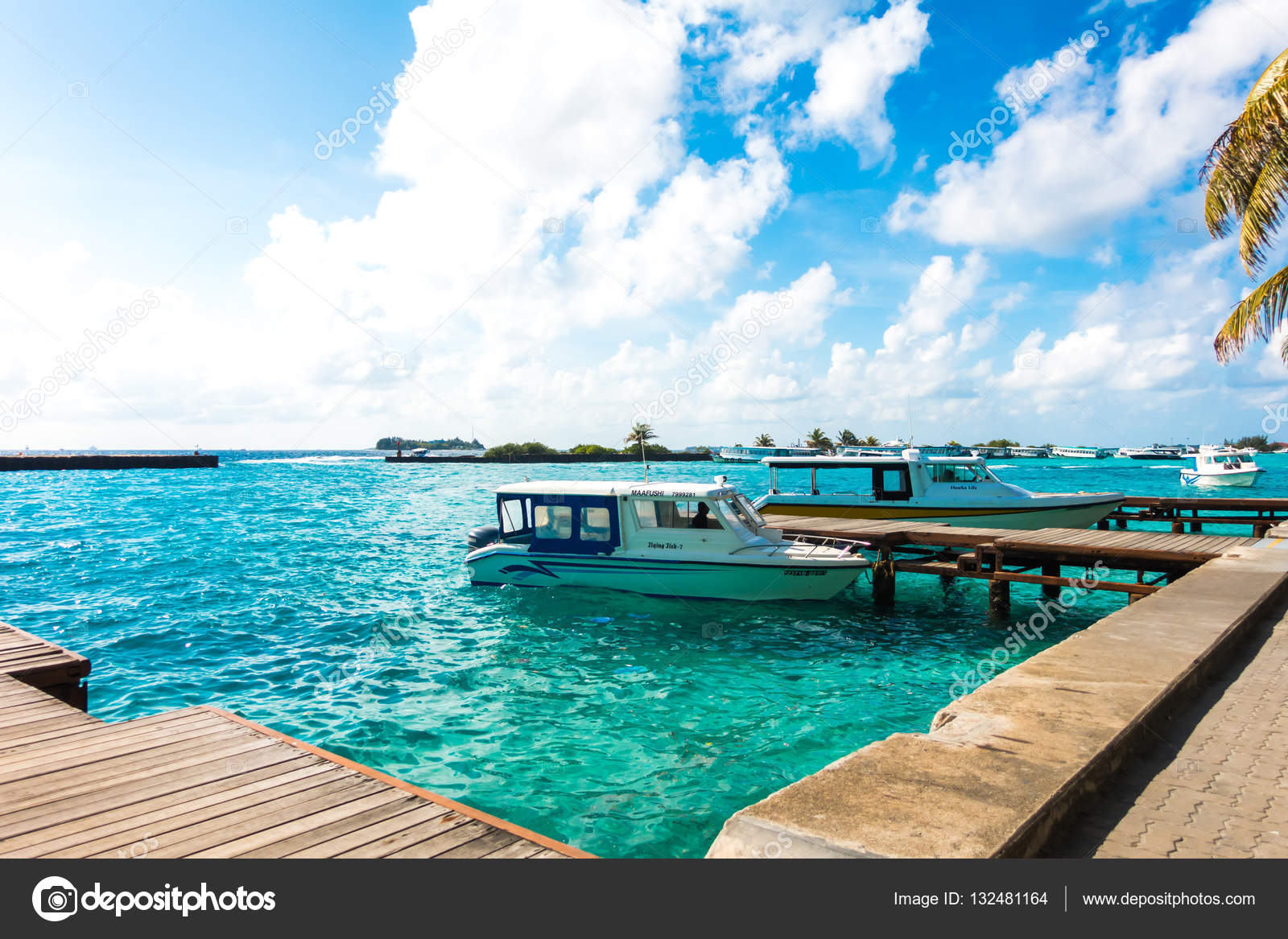 https://st3.depositphotos.com/1164721/13248/i/1600/depositphotos_132481164-stock-photo-male-maldives-october-04-boats.jpg