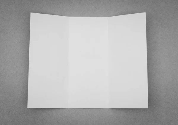 Trifold white template paper on gray background . — Stock Photo, Image