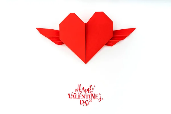 Red paper origami heart with wings on white background . — Stock Photo, Image