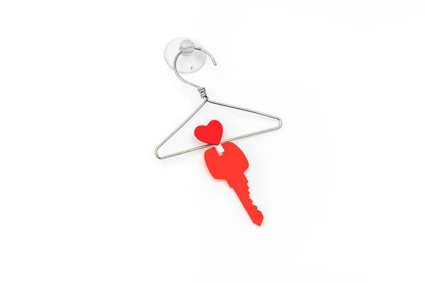Red paper heart hanging on white background . — Stock Photo, Image