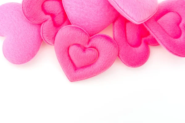 Розовая подушка сердца на белом фоне  . — стоковое фото