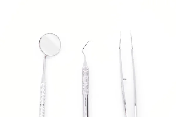 Dental tools and equipment on white background — Stock Photo, Image