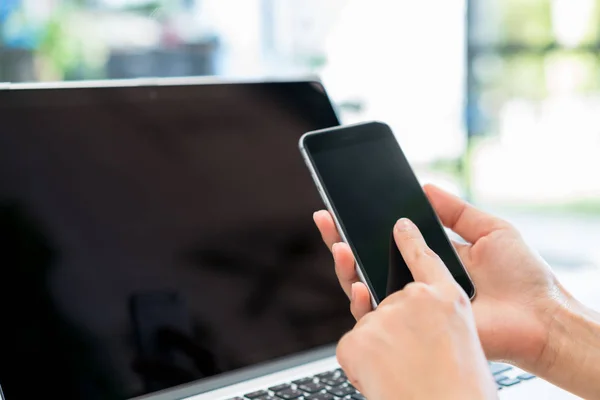 Closeup of business woman hand typing on laptop keyboard with mo — Stock Photo, Image