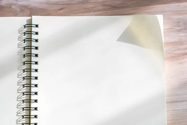 Blank notebook mock up on wood background — Stock Photo, Image