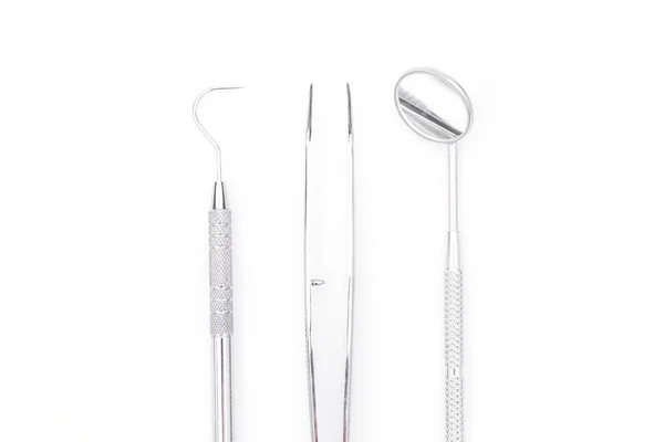 Dentystyczne narzędzia i sprzęt na tle — Zdjęcie stockowe