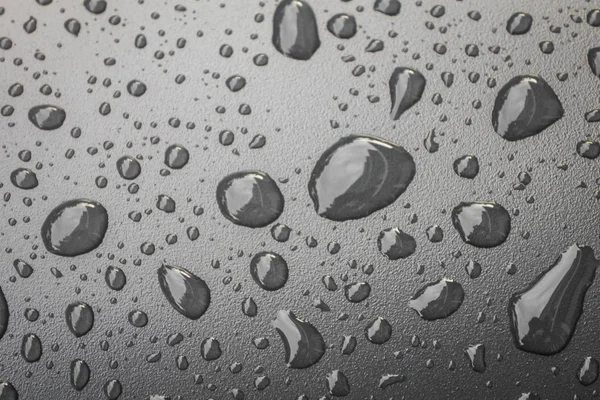 Gocce d'acqua su fondo nero  . — Foto Stock