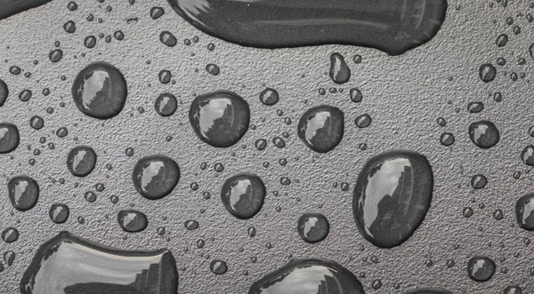 Gotas de agua en negro blackground  . —  Fotos de Stock