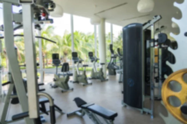 Abstract blur Fitness center with traineger equipments . — Stock Photo, Image