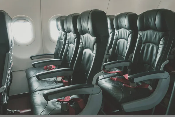 Airplane seats in the cabin .( Filtered image processed vintage — Stock Photo, Image