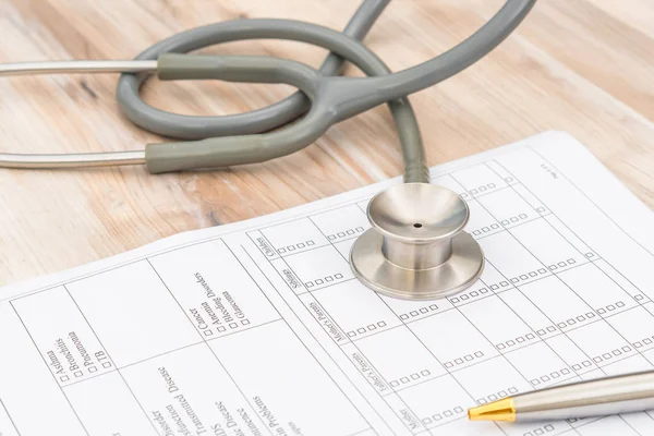 Stethoscope on Patient information — Stock Photo, Image