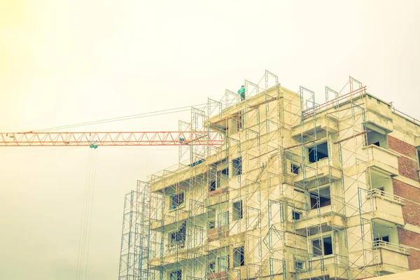 Crane and building construction site ( Filtered image processed — Stock Photo, Image