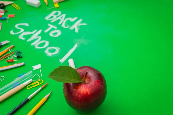 School supplies on Green chalkboard " Back to school background — Stock Photo, Image