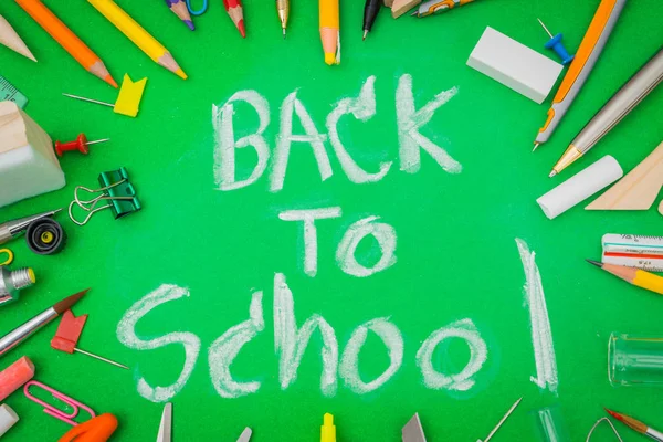 School supplies on Green chalkboard " Back to school background — Stock Photo, Image