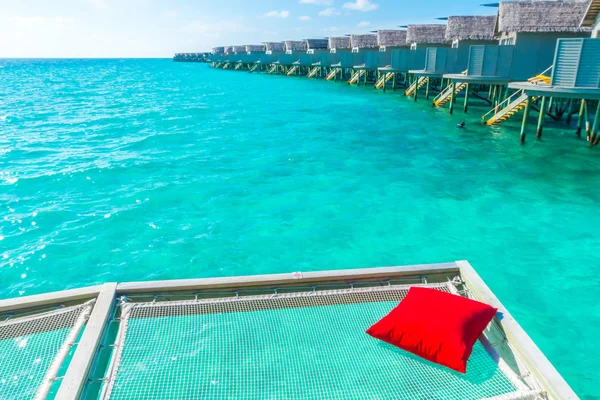 Παραθεριστικές κατοικίες καθαρή θέση στο τροπικό νησί Μαλδίβες και την ομορφιά του το — Φωτογραφία Αρχείου