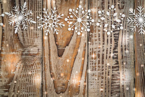 Paper Snowflakes Wooden Background — Stock Photo, Image