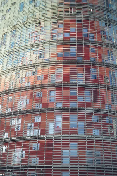 Close up of futuristic building with red facade