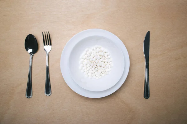 Plate Full Pills Cutlery Wooden Table — Stock Photo, Image