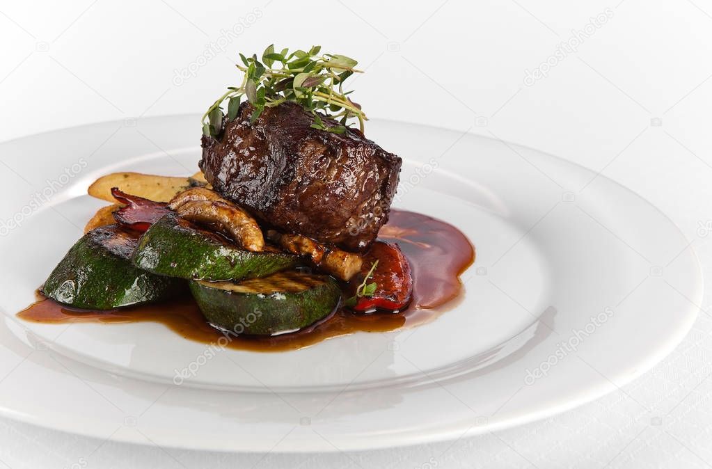 grilled beef steak rare sliced with vegetables