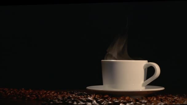 Coffe cup with roasted beans — Stock Video