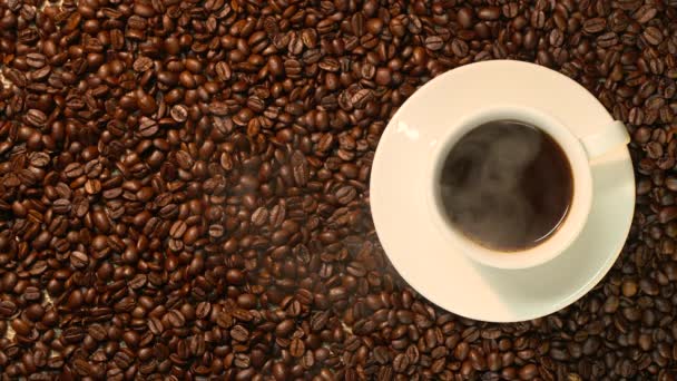 Coffe cup with roasted beans — Stock Video