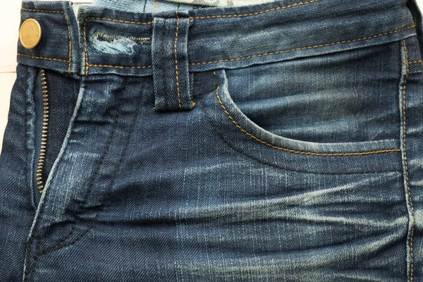 Plutôt vieux jean bleu ont des rayures et des textures de fermeture éclair — Photo