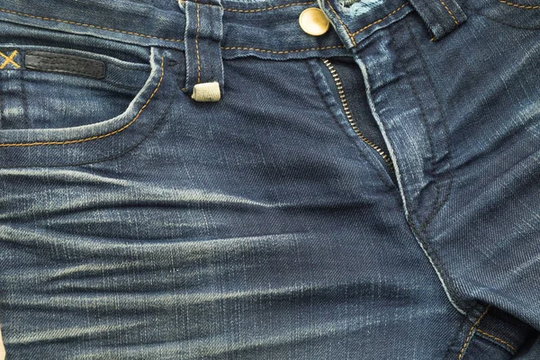 Ziemlich alte blaue Jeans haben Streifen und Reißverschluss Texturen — Stockfoto