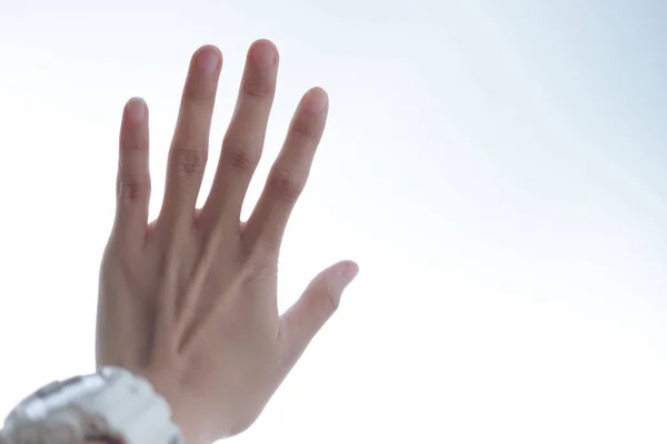 Hand of young woman wearing white watch have white are backgroun — Stock Photo, Image