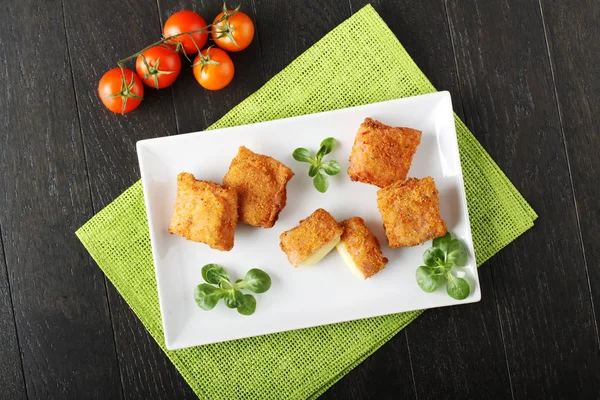 Crispy rolls of ham with cheese Stock Picture