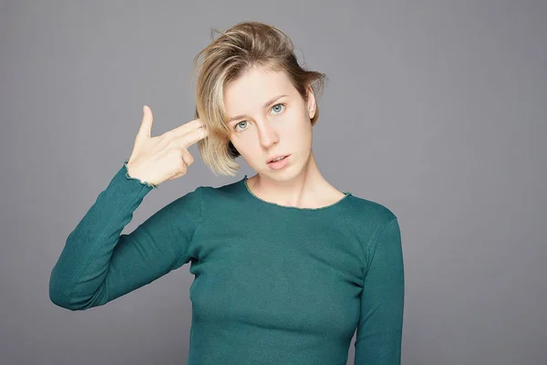 Tired Overworked Blond Caucasian Female Shows Gun Sign Temples Feels — Stockfoto