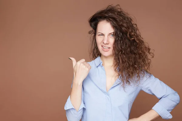 Horizontal Indoor Shot Beautiful Grimacing Woman Looks Pensively Aside Being — ストック写真