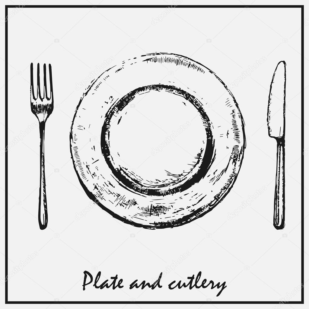 A painted plate with a fork and knife isolated on a light background.