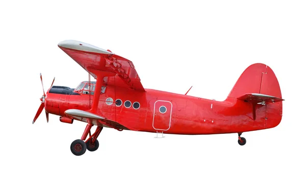 Piros repülő kétfedelű dugattyús motorral — Stock Fotó