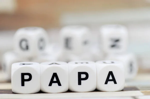 Papa dice letters — Zdjęcie stockowe