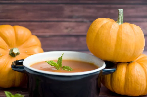 Pumpkins and pumpkins soup — Stock Photo, Image