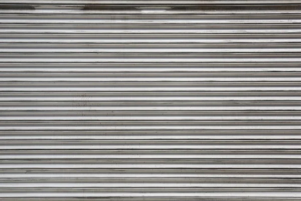 Metalen rolling shutter-achtergrond — Stockfoto