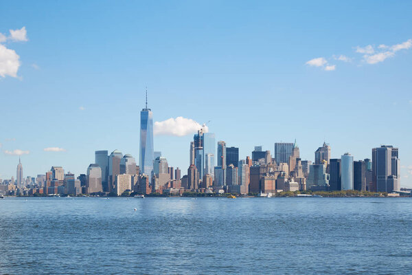 New York city skyline view in a clear day with blue sky