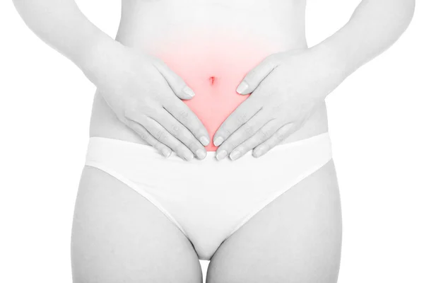 Mujer joven con ciclo menstrual, área dolorosa roja aislada en blanco —  Fotos de Stock
